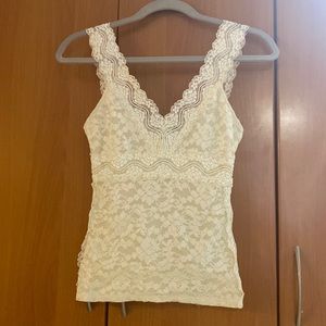 Creme colored lace tank top in xs.